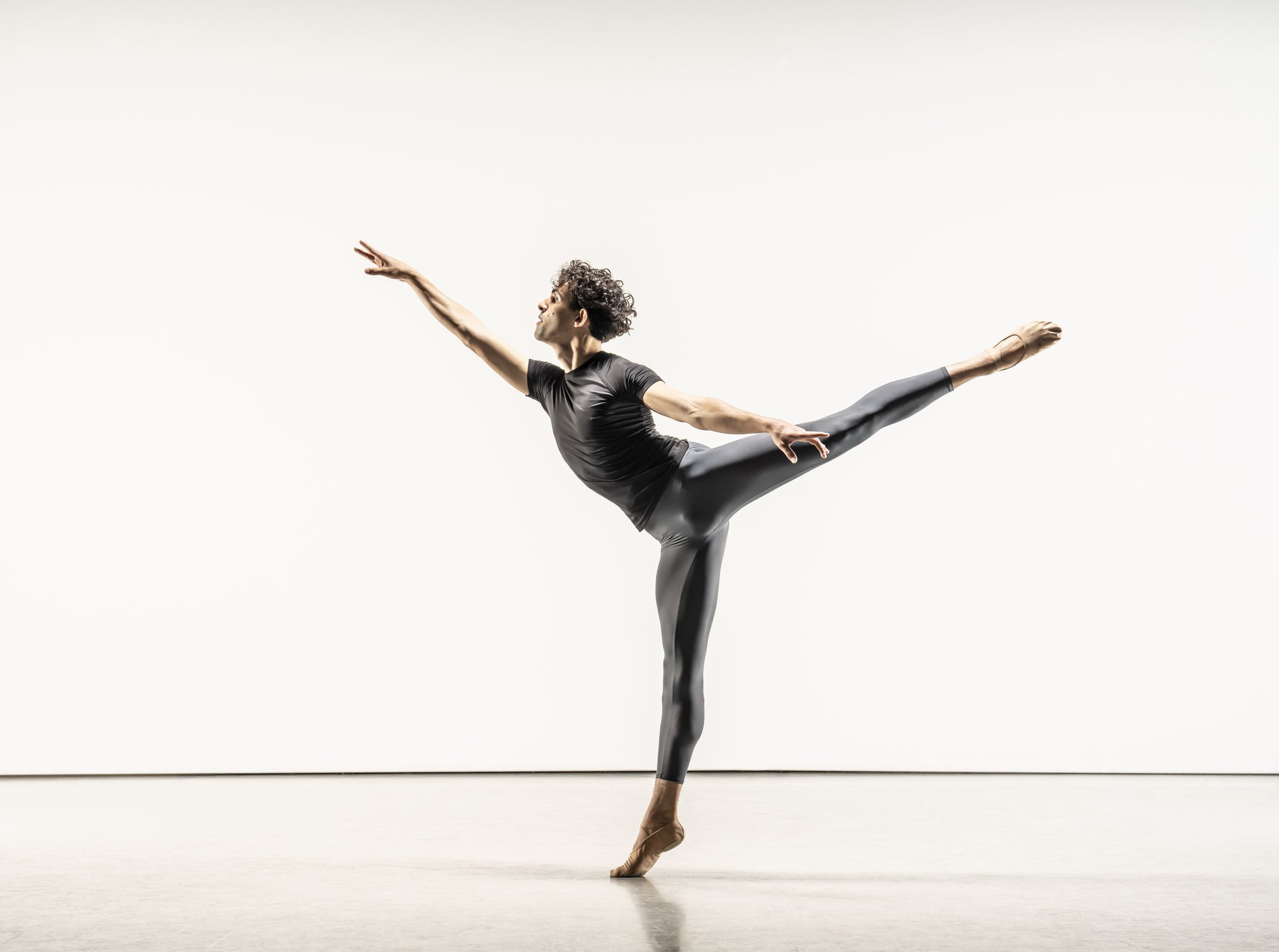 Leo Morad in standing arabesque
