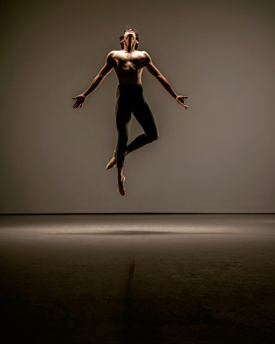 Leo Morad jumping, arms outstretched