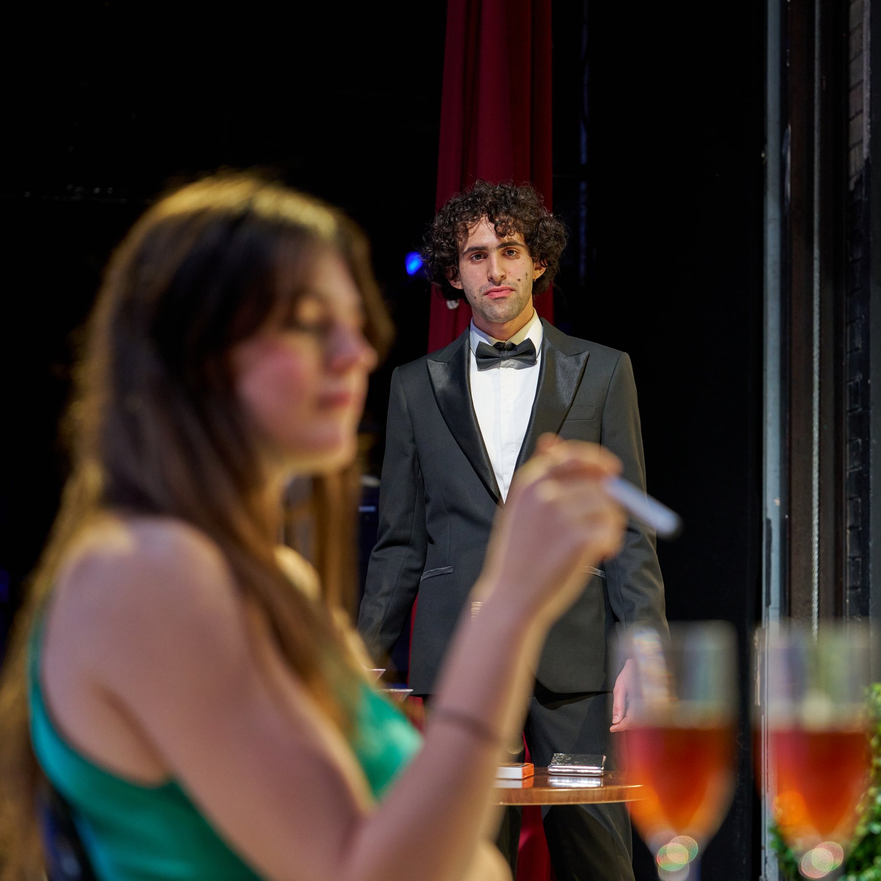 Leo Morad on stage in a tuxedo, Private Lives